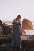 I bought this dress for my engagement photo shoot and I couldn't be happier. The dress comes very long so I did have to get it hemmed a few inches but after that it fit like a gem. The slit goes to a perfect height making it sexy but not too much. The skirt is lightweight and flowed beautifully in the beach breeze. This dress made me feel like a princess and my photos looked like a fairytale. - Victoria D.
