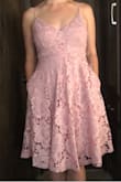 Seriously. This dress is perfect AND IT HAS POCKETS!!! Even with a normal strapless bra it didn't peek out anywhere, though you could wear it without one.
It's heavy weight, really nice quality! I'm between a M and L, bought a medium and it fits perfectly, perfect length and overall really nice flattering fit! - Laura C.