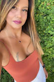 Cute top. You can dress up or down. Fits perfectly. - Grimanesa K.