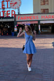 This dress is so cute and flattering! The material has some stretch to it, which I think is super helpful in fitting a lot of different body types. It's definitely a fun thing to wear, especially with how full the skirt is. I would classify it as more casual than fancy just because of the material and shape, but it looks like it could be dressed up with some heels! I just throw on some white sneakers and I'm good to go :) Would recommend! - Alyx R.