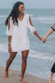 I ordered this dress for engagement pictures after another one was too small, and I am so happy I went with another dress. It wasn't too loose to where it feels too big, but just perfect for a beach style shoot. I was a little worried that it would be too short in the back, but it wasn't bad at all and it passed the raised arms test. I would definitely order this dress again in a different color! - Brianna C.