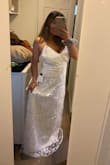 I love it ! It's honestly so cute and great material for the price, can't wait to wear it on my wedding day! It's a little long only because I'm short. I ordered a small - Elizabeth D.