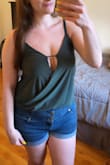 This is super cute! I'm still not completely sure how I'll wear it out, this photo includes a sticky bra and some taping, lol. The top is a great material and I think is worth it, though. - Leah Z.