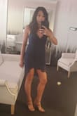 I wore this to a wedding & got so many compliments. Im in between sizes so I ordered a small and a medium. Small was very fitted and medium was a little loose. There was extra material ruffling up on the back so I kept the small. I wore it with an adhesive bra since its very low back. I love this dress! Especially the straps are adjustable. - MARIA M.