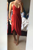 I was unsure of the sizing because I never fit into XS now, but based on other reviews, the S would've been too baggy. The XS is a little tight around my chest, as you can see in the photo. However, if it was any bigger, I probably wouldn't like how it fit. Definitely size up if you have a bigger waist and chest. Overall, sizing was pretty good and the material is light and flowy. Great purchase and love the color! - Ashley S.