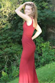 It fits absolutely perfect. Definitely ordering another dress!! - Haley B.