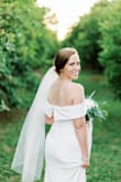 We had to postpone our wedding so We eloped. I purchased this dress for our elopement. And it was perfect! Comfortable and gorgeous! The material was a little thick and heavy for the AZ heat but it was still amazing! So happy with this purchase. - Meagan C.