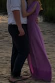 Material is very cheap. There were a couple snags when the dress arrived and the material will snag easily. 
Great flow and look for engagement pictures but I would not choose this dress again. (Dress was wet when this photo was taken) - Mikayla E.