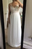 I had to postpone my wedding, so I wanted to find an alternate wedding dress. I tried this one, along with countless other Lulus dresses. This dress is very flattering as the thick band sits perfectly on the waist. It also has adjustable straps so I could hike up the dress a bit more without needing to alter the top. Although I didn't go with this dress, it was my runner-up! - Amanda M.