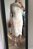 I bought this dress amidst having to postpone my wedding, and no longer needed it. It was tight but felt supportive, which also made it more comfortable and flattering. I would've definitely needed to add cups to this dress, but otherwise, it would've been perfect as is! - Amanda M.