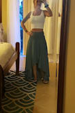 This skirt is so cute, fits perfectly, and is very figure flattering. I wore it in Jamaica on our honeymoon and ate tons, still comfy due to the high waist. - Elizabeth T.