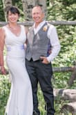 This dress is simple, yet beautiful. The bow at the back is a unique detail that makes the dress stand out. The fabric is very comfortable, and worked well in the hot weather the day of our wedding. It was a bit long, so I did need to have it hemmed. I also chose to add a silk sash around my waist. I ordered and sent back several dresses before settling on this one and found Lulus very easy to work with. I had no issues with my returns. - Amy W.