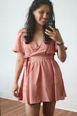 I love everything about this dress. It is so romantic. It is a wraparound dress, which accentuates your curves. The puffy sleeves are long which keeps them from being overwhelming. And the cut in the back coupled with the length add just the right amount of sexy. Highly recommend this dress. - Abigail G.