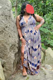 I really love this dress! Very flowing, comfortable and sexy. I received a ton of compliments. I ordered the x-large it did not hug my waist so I should have got the large instead. It has a deep cut v in the front so I had to just tie the neck higher so it could hug my waist and keep my girl inside that deep v cut.....overall great buy!! - Natalie S.
