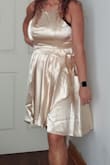 I love it and if I would have known it runs small, I would have gotten a larger size and I got it in a final sale. No return or exchange so now I have to take it to a tailor and hope they don't charge me too much to have it let out. - IRIS S.