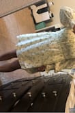 I'm a true medium. This dress kept falling off my shoulders. Way to big and wide. Final sale. I can't return. Size down - Penelope G.
