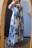I normally wear a size 14 or XL and dresses. So I ordered the XL. I had to pin the bust area because of the openness. This is normal for me so I expected that. I did not expect that the seam under the bust was only 34 inches around. I did not want to return the dress because I really like it and a bigger size was unavailable. I ended up cutting a piece of the underwrap part of the skirt, opening up the side seams on the torso, and adding the cut piece of fabric to the sides of the dress. I am happy with my end product, and I am happy I was able to order this dress and customize it to fit me. I do not think I will order any more dresses from Lulu's as I am apparently too large for their clothing. But I will happily keep this dress. - Katie M.