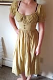 This dress is great at accentuating the curves you have! Thin lightweight material that will be great for the hot summer days ahead. Has side zipper and you can tighten/loosen the chest. - Kendra T.