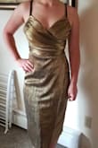 Not a bad purchase for a final sale item. Yeah the bust is a bit loose with extra material but it will do. I do like the gold color and length. - Kendra T.
