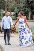 This dress was amazing! Perfect for my engagement shoot. It flows beautifully and looks great on my skin. It is pretty long. I wore 3 inch heels and it was still dragging a bit. I would have it hemmed or just be prepared to walk carefully. I didn't have it hemmed and I don't regret it. - Lauren A.