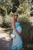 Love the crossover front cut of this dress and how it falls, it's so flattering. I was looking for flowy dresses I can wear now (while pregnant) and post-pregnancy in my same size. Ordered this in my normal small and since it's plenty flowy it still fit! Adjustable straps is very helpful for tall girls like me too. Really well made and comfy! - Becca K.