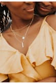 Quite lovely. It does get tangled. Wore it for my engagement pics and it was great. - Sandrine Z.