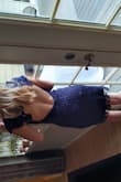 This dress is beautiful and very well made.  Purchased for my granddaughter for a wedding.  It fit perfectly.  My granddaughter is a  junior size XS, and is 5'4".  The dress was a little longer on her than the model due to her height.  otherwise a perfect fit.  The only complaint was, it was a little bit scratchy.  It didn't seem to bother after a few minutes.  She wore the dress beautifully and seemed perfectly comfortable throughout the wedding.  I paid for 2 day delivery and it arrived exactly when it was supposed to.  Thank you.  Will be ordering from you again! - Cyndra N.