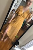 This is honestly my new favorite dress. I wore it to a wedding and got so many compliments. I didn't wear a bra with it but the girls aren't very big. It does have a little like slip underneath so it's not see-through. Bought a medium and thought it was the perfect size. Will probably wear it until I can't wear it anymore. - Anne B.