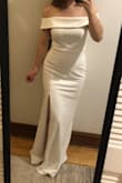 I got this as a potential elopement dress since Covid screwed up my original plan. The material is pretty thick and stretchy making it very comfortable and flattering. The simple and modern design makes it look more expensive than it is. Would need to steam out the wrinkles. My only regret is that it doesn't have a train, though it is a bit long on my short 5'3' self - I was wearing 2" heels in these photos.  Loved it! - Lauren D.