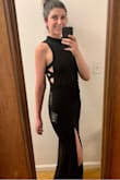 I was a little worried about getting a small because I'm tall, but it was definitely long enough for me. If you are shorter, you might have to wear high heels or get it shortened. Stretches a lot. Super pretty. Can't wait to wear it to an event! - Audrey G.
