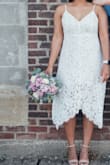 Loved this dress! I wore it for my small backyard wedding, and it was perfect. I originally ordered a size L but it was a bit too snug with the lining so I exchanged for a XL which was very comfy. - Devin S.