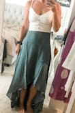 I wore this with the high waist green skirt and tho it looks like a crop on others it is perfect for me! It doesn't show as much skin as in the picture but is still cropped fit! Super soft and made well! - Dawn B.