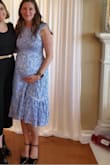 Beautiful dress. True to size. Wore as a maternity dress. Enough stretch for a growing chest and enough room for a pregnant belly. - Olga R.