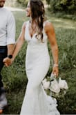 This dress was gorgeous ! So comfortable and It fit perfectly besides the length was too long but still wearable. I postponed my large ceremony for next year and didn't want to wear my real wedding dress so I purchased this dress and it looks just as expensive as my real one, everyone loved it! - Bryann R.