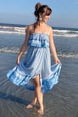 This dress is super cute, my absolute favorite color. The material is thick and has multiple layers. I'm not sure if this is the dress you want to wear to accent your waist line but I'm very happy with it. I'll wear it again and again :) - Natalia Z.