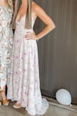 I LOVE this dress! It worked perfectly for my best friend's bridal shower and got so many compliments. The only downside is that it was a tiny bit too long, but if I had worn heels it would have been fine. And the from V is a little deep for me because I'm pretty flat-chested so I used tape to hold it down. 100% will be wearing this again as soon as possible because it is flat our gorgeous! - Candie S.