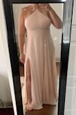 I ordered this as a bridesmaid dress and it fits perfectly! I was worried that the dress would be too short because I'm 5' 7" but it's not. I'm very pleased with this purchase, especially for the price! - Elizabeth H.