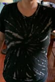 I'm normally a small but based on reviews I ordered an x-small. Glad I sized down BUT the light tye dye Swirls are really faded and not as light as in the picture. The swirls on the black shirt look more grey and make the shirt look dirty. Really disappointed because I was so excited about the shirt. Wish I would have gotten the grey but didn't want to go through the hassle of returning then waiting. NOT worth the price so definitely move on. :( - Melissa S.