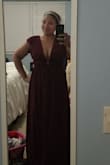 I waited to order this dress in a large and decided it wasn't coming back in stock sin enough for the wedding I'm going to. So I took a chance and got the medium. The way the dress sort of comes in at the bust, holds the girls perfectly in place so i don't even need tape! It's so flattering and I cannot wait to wear it out. Honestly every item I've gotten from here has been amazing and makes you feel super sexy. - Tiara M.