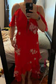 This dress is gorgeous! I bought this for my engagement photos. I do think this runs a little small. I'm usually a large in Lulus and other designers but I had to get an XL to make sure it wasn't too snug. - Meghan F.