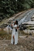 This dress is so pretty! I love how simple it is. I added a belt to give it a little pizzazz! It's super long but everything on me is as I'm only 5'0"! The skirt is slightly tight but not overly. The top fits perfectly. - Tara B.