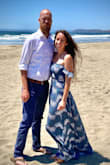 I wore this to my brother's beach wedding. Be warned though: it is VERY sheer! I wore shorts under just so I felt more covered up. It was so flowy and pretty in pictures. It is a bit long, but was fine with some heels. - Ally K.