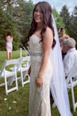 I had to postpone my wedding and bought this dress for an intimate backyard ceremony. It fits true to size and is absolutely beautiful. I added a belt from amazon. - Kyla M.