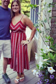 Was a bit large/loose in bust and hung low in back. I would order a smaller size. I did get lots of compliments though. Loved that it didn't wrinkle!! - Briana L.