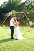 Threw together a backyard wedding last minute due to COVID canceling 2020. Desperately ordered a whole slew of dresses from everywhere and this arrived in the knick of time. I ordered an XS because it was the only size available at the time but it ended up fitting perfectly! I wore petals over my nips and added on the belt that was going to be for my actual wedding and it went perfect. I was concerned about length, but after wearing 2-inch heels the front barely touched the ground and I had a mini train in the back for a truly bridal effect. - Joanne L.