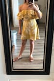 This dress is so fun, cute, and comfortable! Many of the reviews suggested sizing up so I got a S as opposed to my usual XS and the top was too big, it wouldn't stay up. So I'll need to reorder in an XS. I'd say it runs true to size! Unless you have broader shoulders/arms - Julia K.