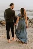 I bought this dress for my maternity photo session, and it turned out beautiful. The material was stretchy and breathable, it allowed me to move around freely.I bought Large because by bust area had grown a lot and I wanted to cover them a little..lol.. - Aycan E.