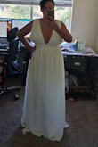 I'm using this as a wedding gown and it is very pretty. True to the picture. It's a bit long so just had to get the bottom tailored. and the bust sewn on the side, just so it wouldn't stick outwards. Just because its top was a tiny bit larger for me. A large would have been perfect but that's ok, that's what tailors are for since I didn't have enough time to return and wait for the new one. Beautiful dress! - Vanessa O.