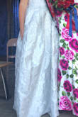 It's crazy for me to be saying that a dress is long on me. I am a tall and skinny girl so most things are short, but this dress just fit a little different. In the photos online it looked like it poofed out a little more but in person there are only 2 layers of fabric all together so there was very slim to no poof to it. It's nice to keep you cool in the summer, but I was expecting the skirt to go out a little more. The dress has pockets which is really nice and it was comfortable to wear. 

The dress was too long on me which was very unusual being a tall girl and the photos showed it being a more full skirt so maybe there's a chance a layer or two got missed while being made. I'm not sure but that seems to have the only explanation as to why the skirt is the way it is. I still loved the dress, but it's not a favorite because of the awkward skirt - Hannah D.