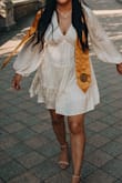 I wore it for graduation pictures and it was super comfortable and flowy like the picture. If you're taller it might be a little short but I'm 5' 2" so it was perfect! - Floridelma R.